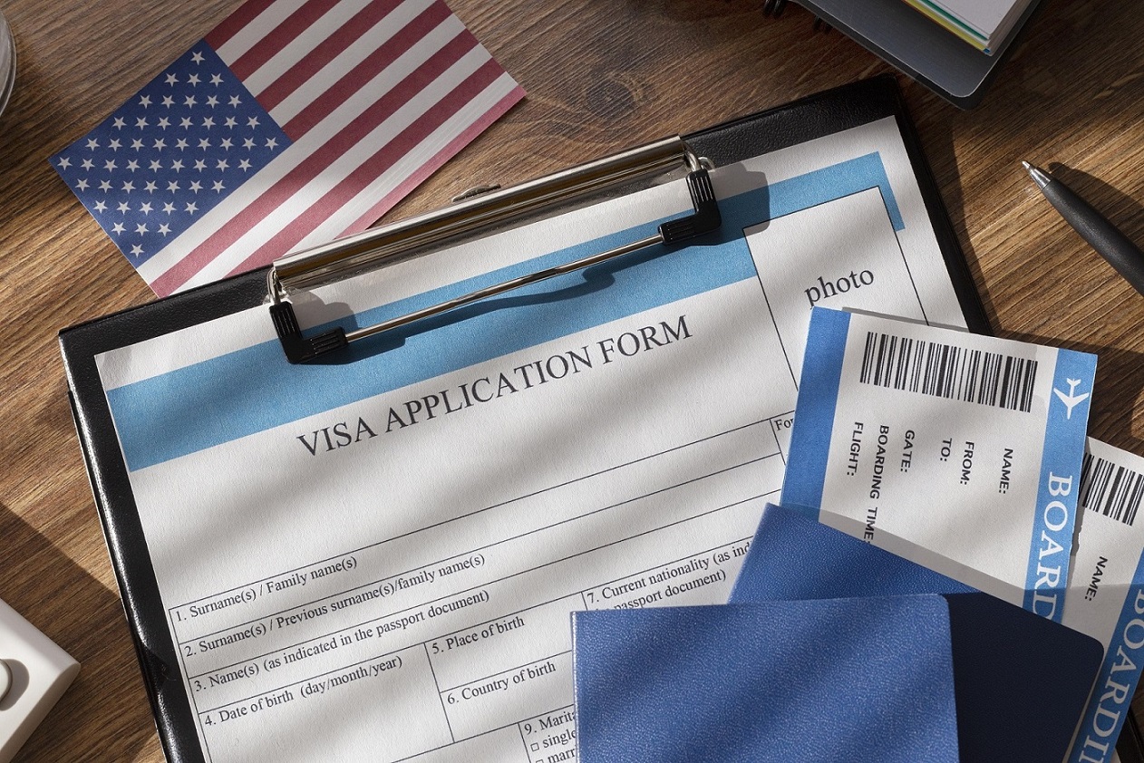 Immigration documents and flag